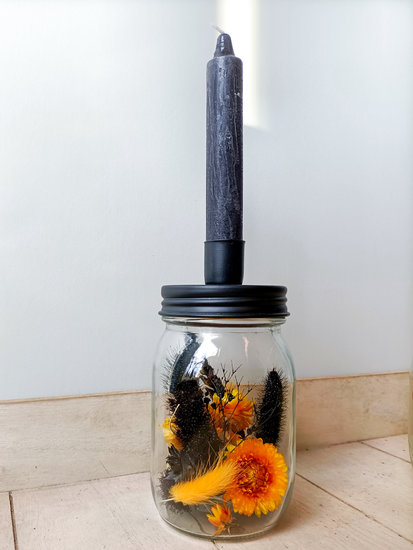 Glas met kandelaar en droogbloemen zwart geel